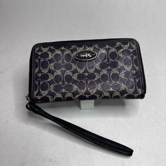 Coach Handbags - Coach Black and Tan Signature Wristlet